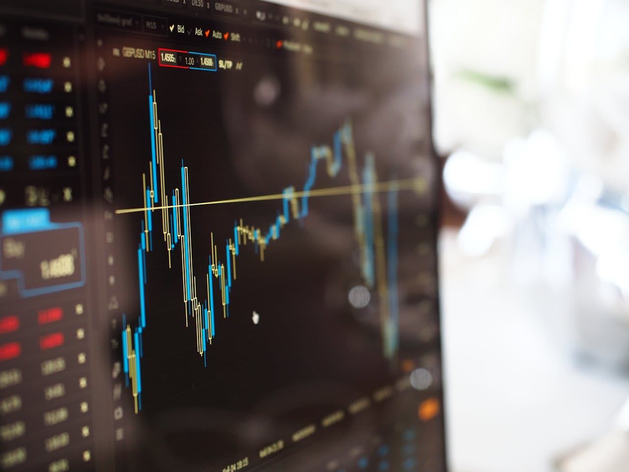 Efficient Data Solutions for Field Services Detailed view of financial trading graphs on a monitor, illustrating stock market trends.